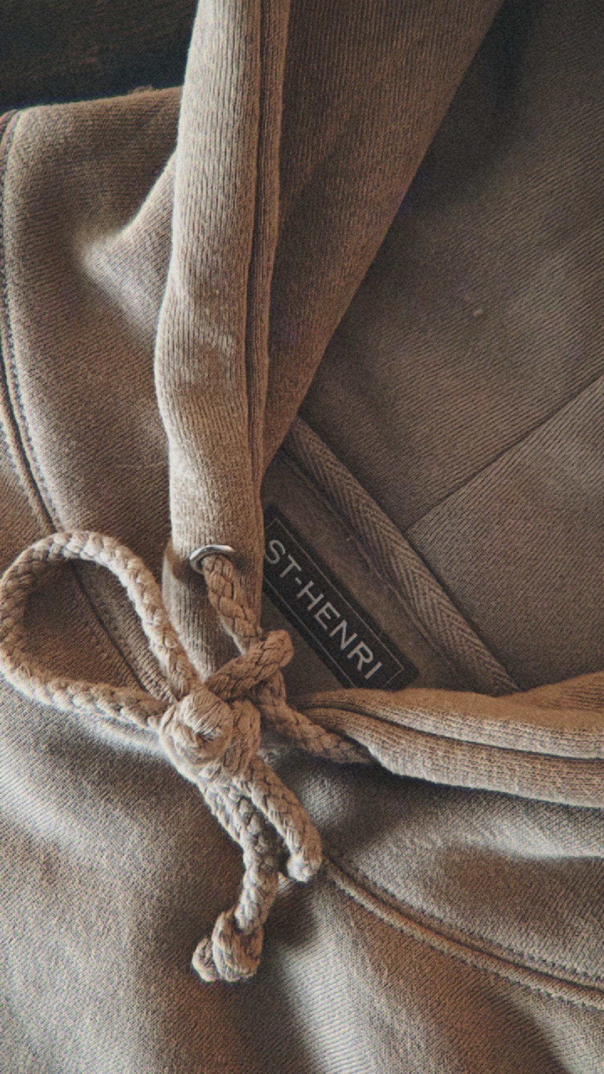 ''Coming soon'' hoodie sand